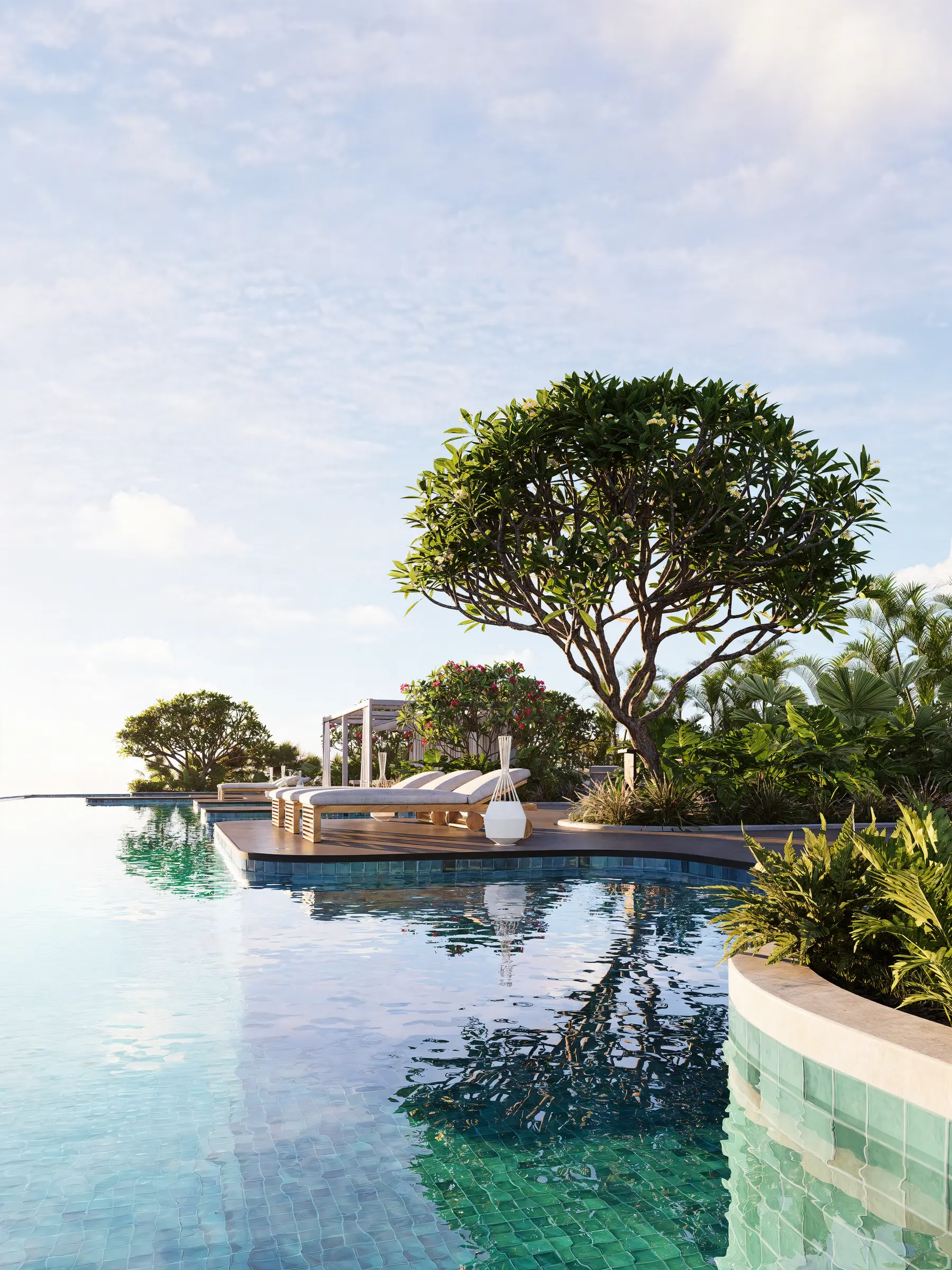 Infinity-edge pool with a planted island overlooking the sea