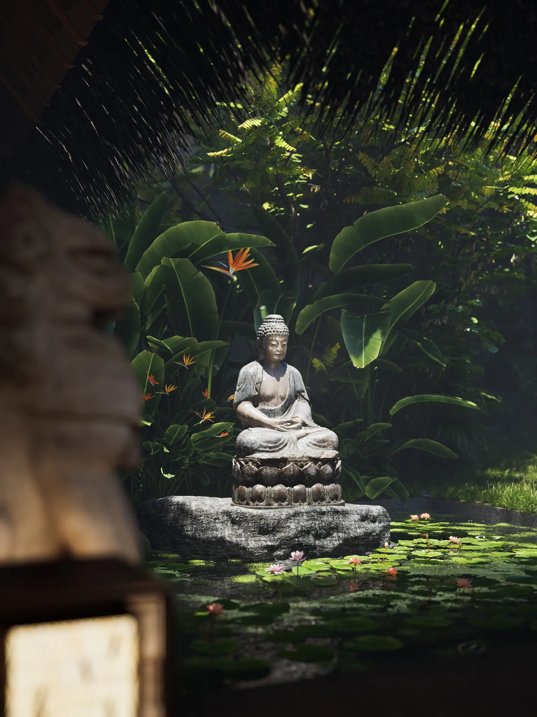 White Buddha statue in a lily pond garden, lit at night