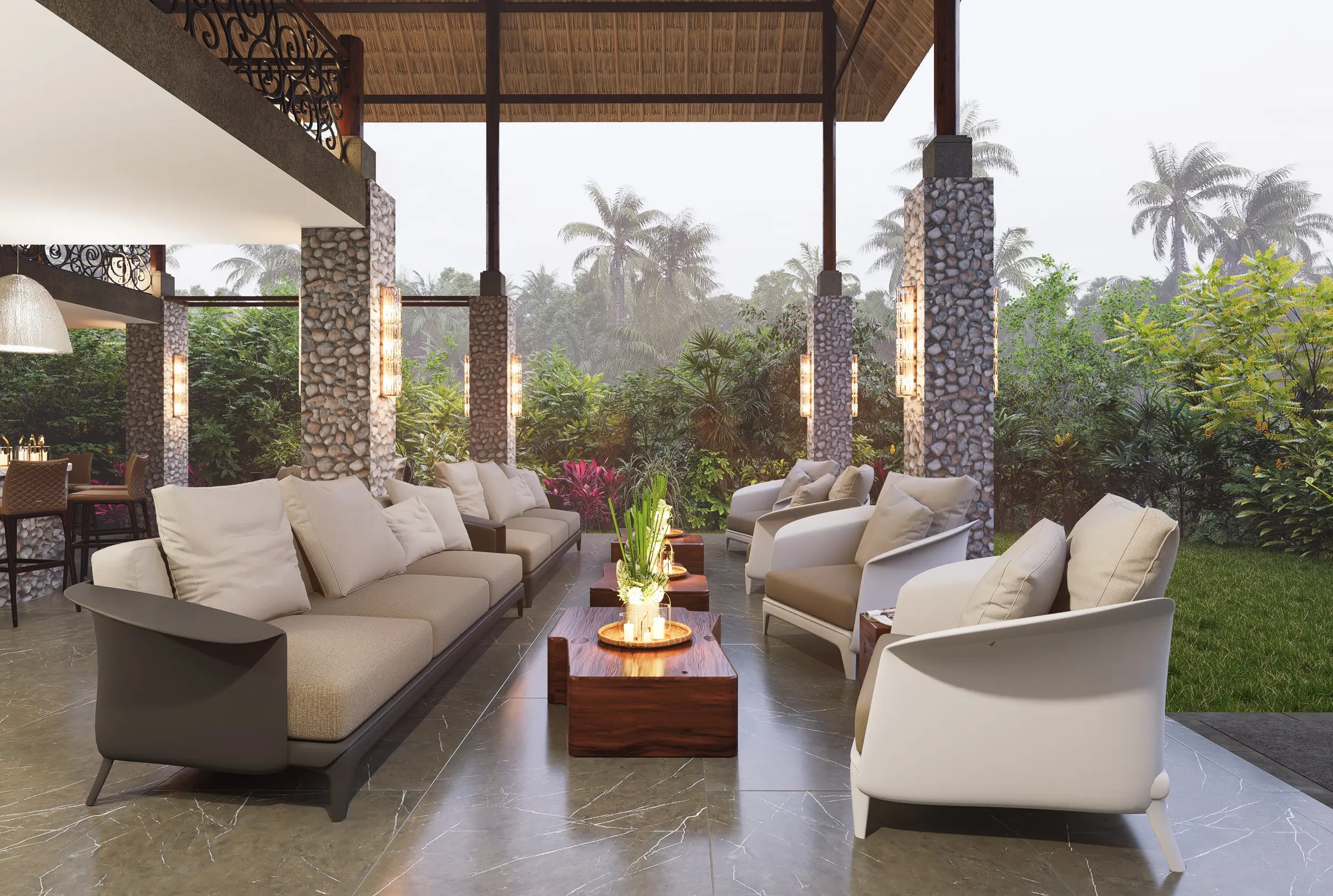 Open-air resort lounge with a fire table beneath a timber and stone pavilion