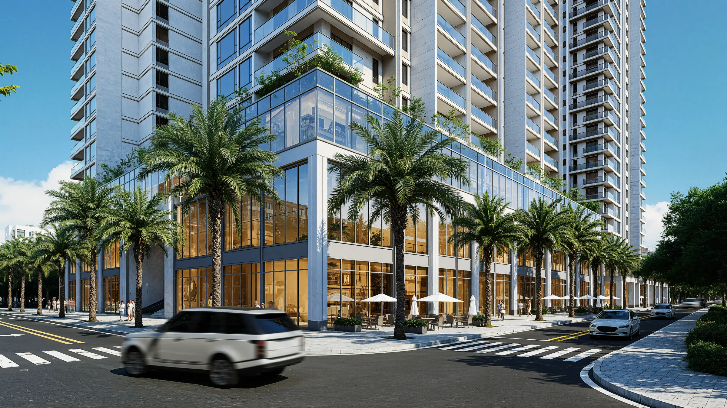 Residential tower with street-level retail on a palm-lined street at midday